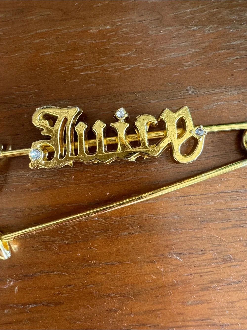 Juicy Couture Gold-Tone Script Safety Pin Brooch with Crystal Accents